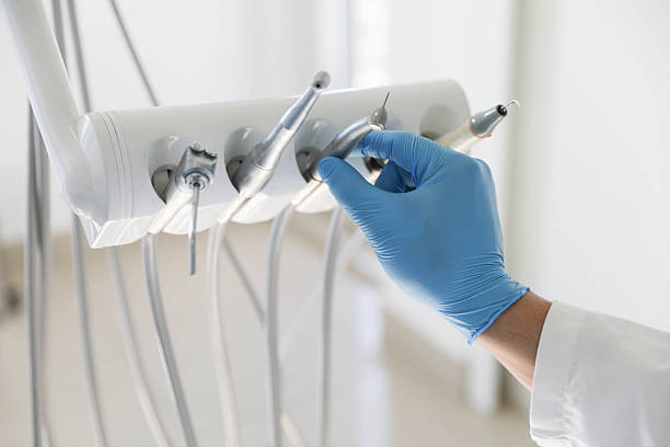 Professional Invisalign Clear Aligners technician working in Sully Square, VA
